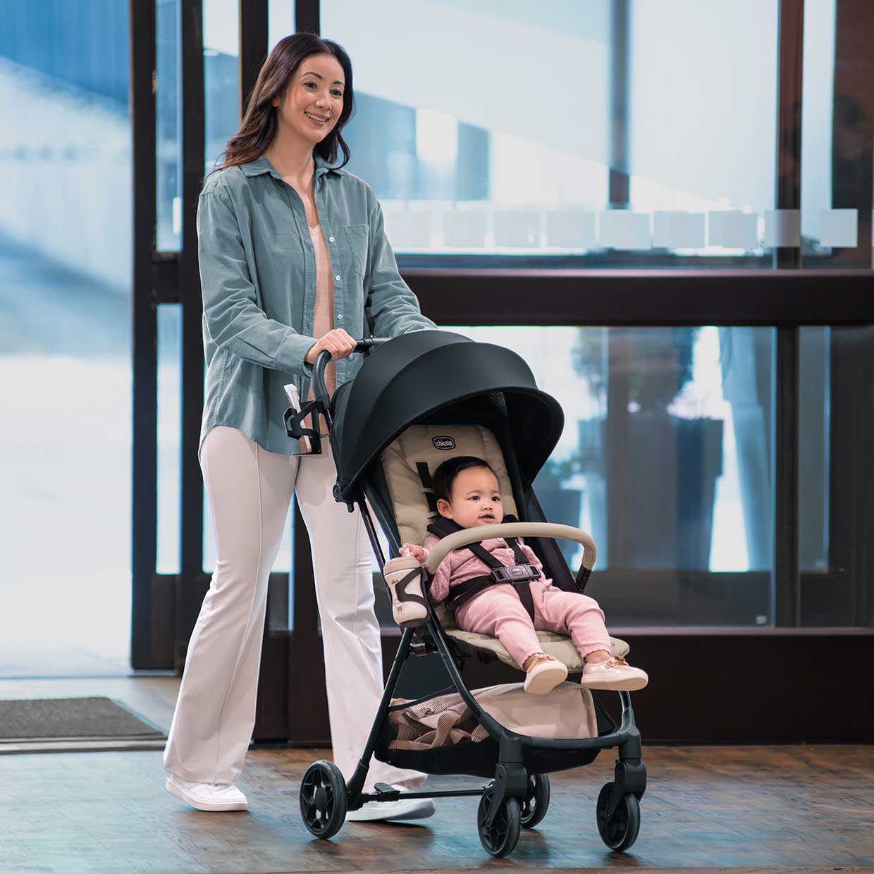 Dad with child in Chicco Presto stroller image