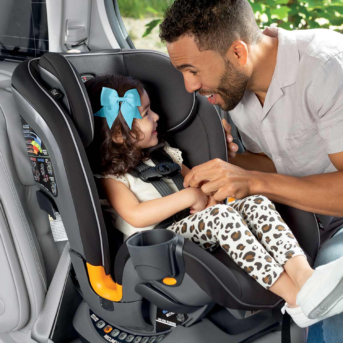 Dad and daughter with Chicco Fit4 Car Seat