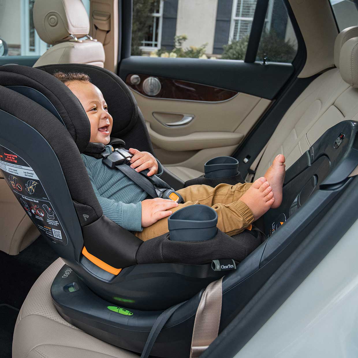 Baby in a Chicco Fit360 Infant Car Seat in rear-facing mode