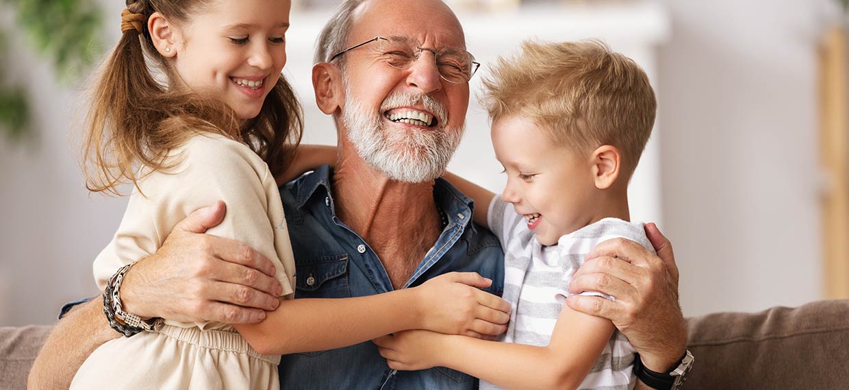 Grandfather with grandkids laughing image