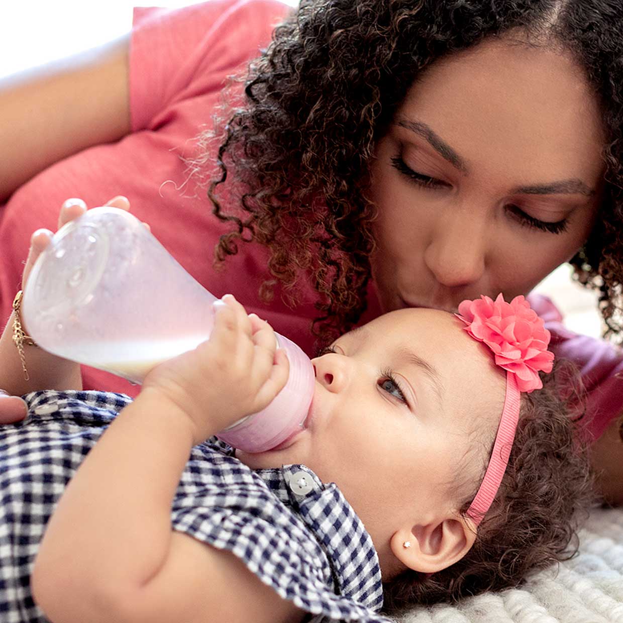 When Do Babies Start Holding Their Own Bottle image